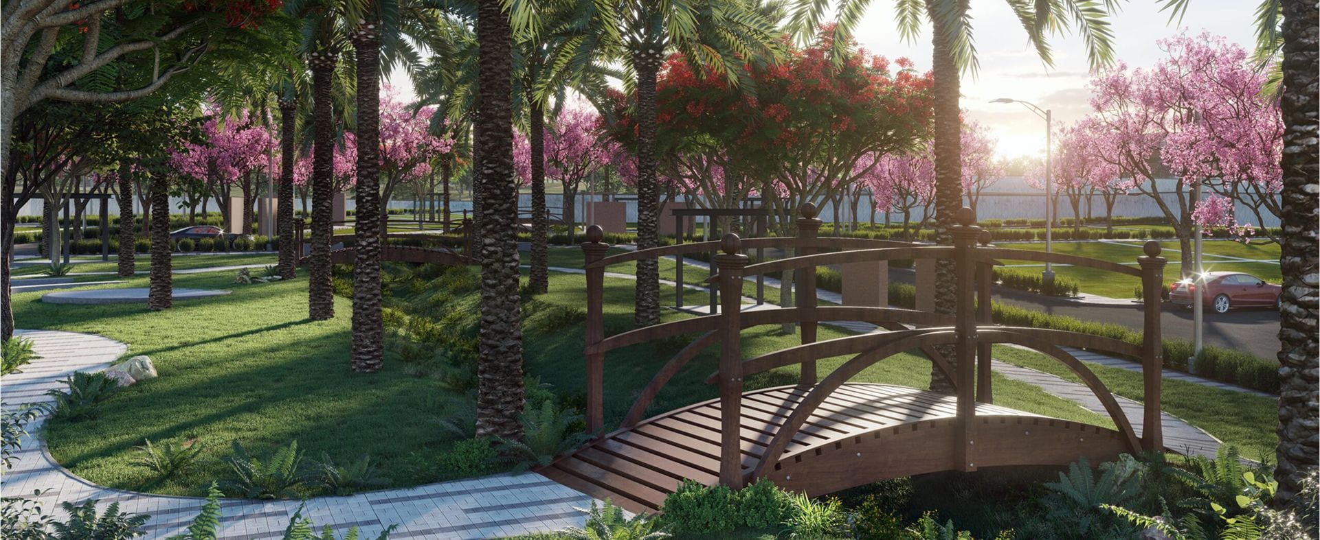 Landscaped garden walkway with blossoming trees and a pergola