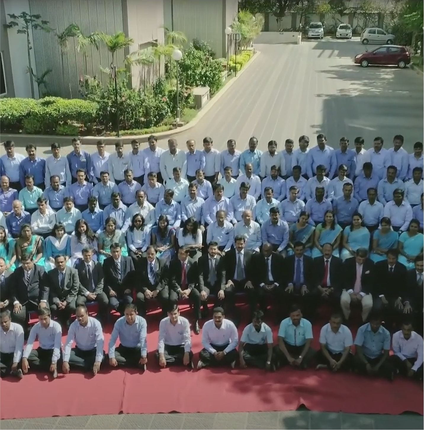 Vaishnavi Group employees group photo at the workplace